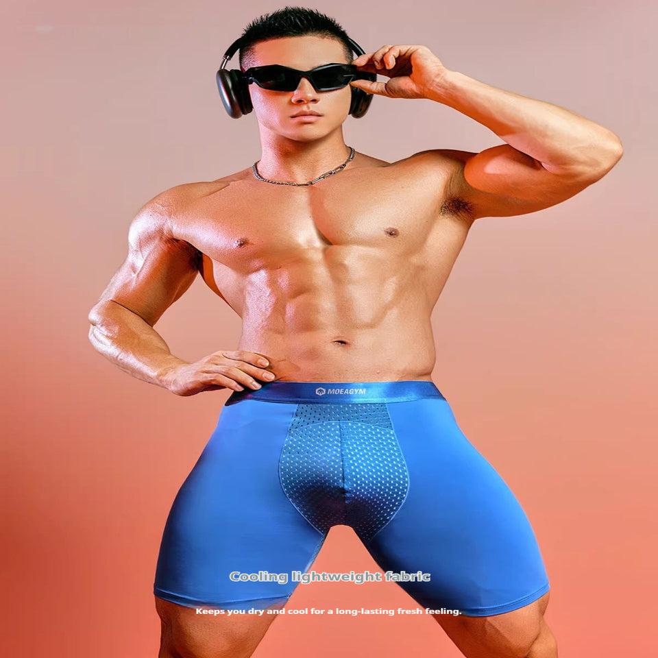 Male model wearing blue men's extended ice silk sports boxer briefs with breathable quick-dry compression fabric.