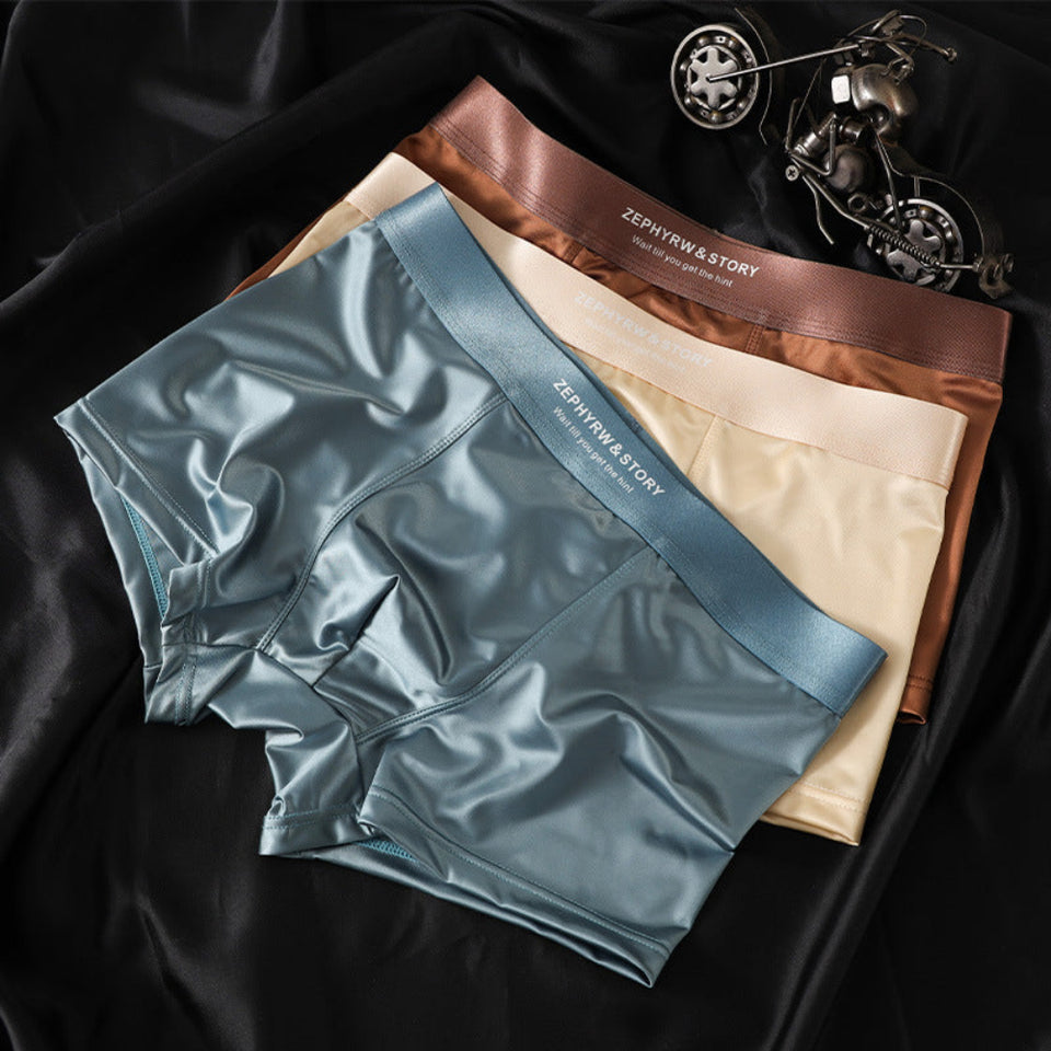 Men's ice silk seamless boxer briefs in multiple colors with breathable stretch fabric and comfortable mid-rise fit.