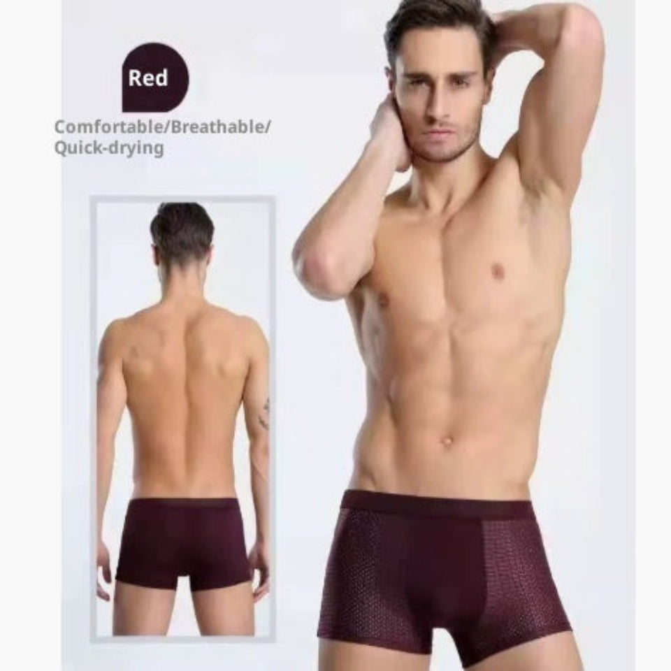 Four-pack men's boxer briefs in assorted colors.