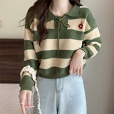 Women's striped long sleeve knit sweater in green and white with contrast stripes