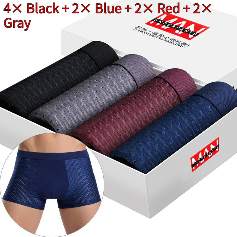 Four-pack men's boxer briefs in assorted colors.